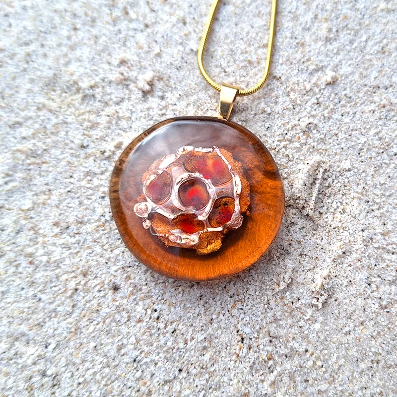 handmade golden glass pendant for power and success